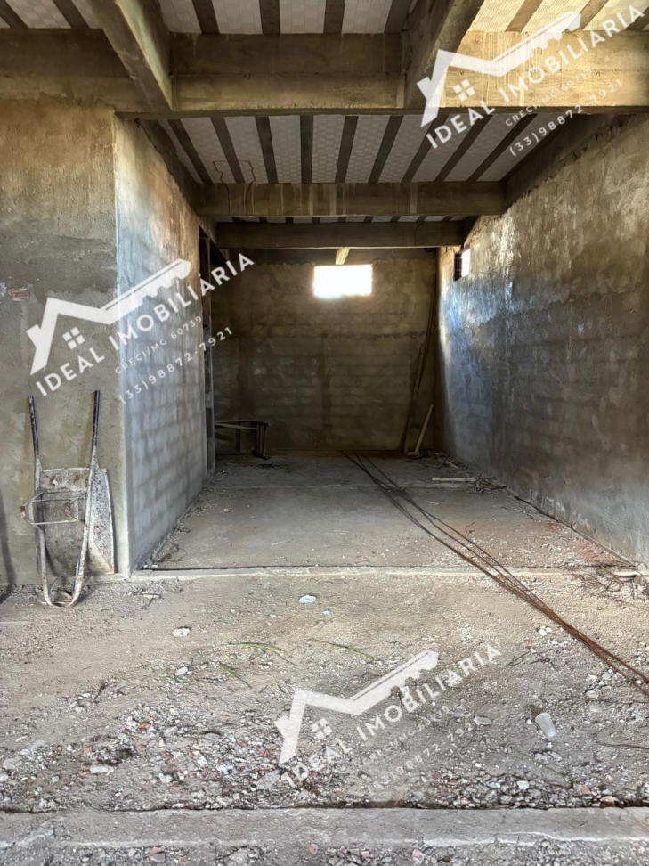 imovel a venda com dois ponto comeciais e 6 apartamentos com sala cozinha dois quartos um quato com suite e banheiro social. construção ainda sem acabamento - #24