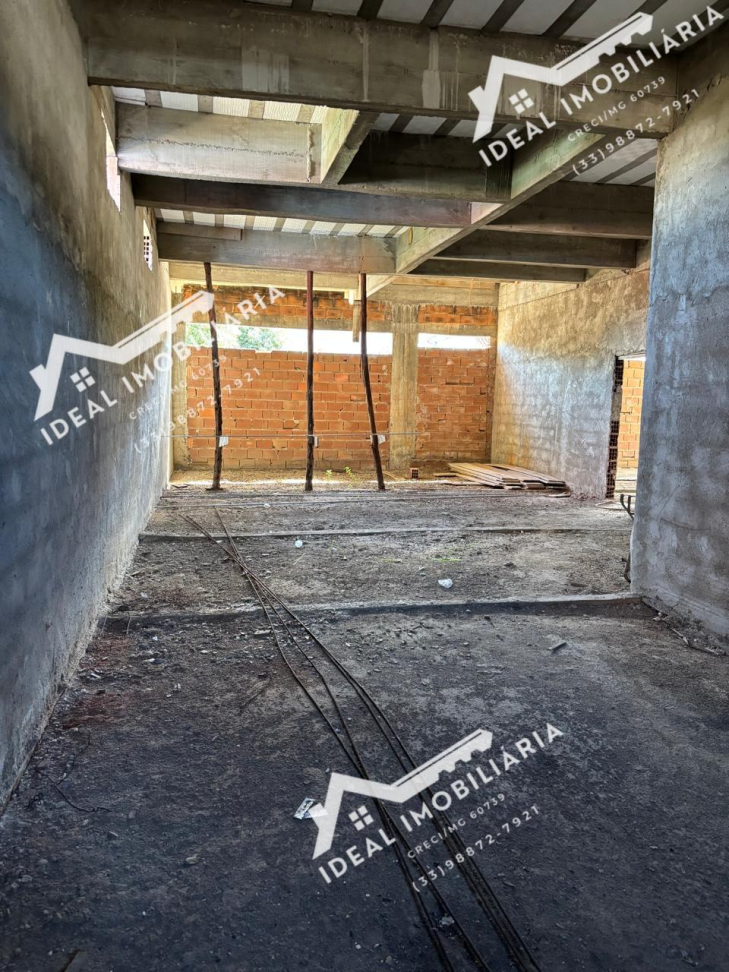 imovel a venda com dois ponto comeciais e 6 apartamentos com sala cozinha dois quartos um quato com suite e banheiro social. construção ainda sem acabamento - #22