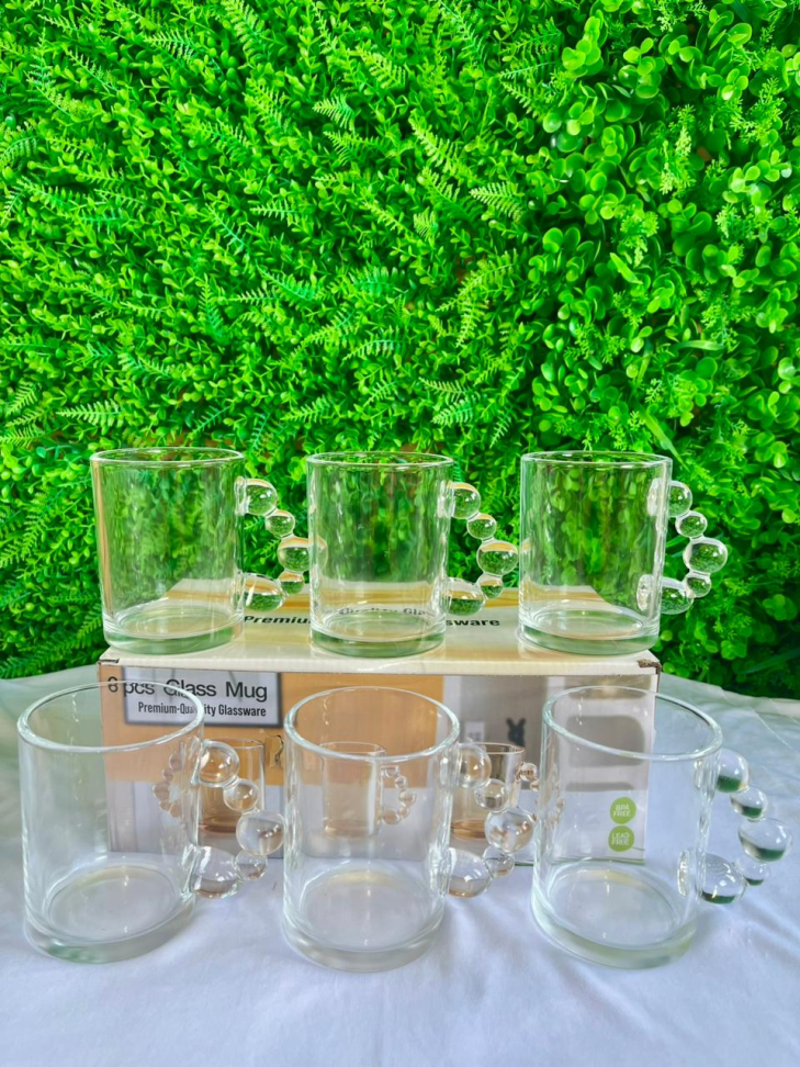 CONJUNTO - 6 CANECAS DE VIDRO TRANSP. COM ALÇA DETALHADA - 330 ML