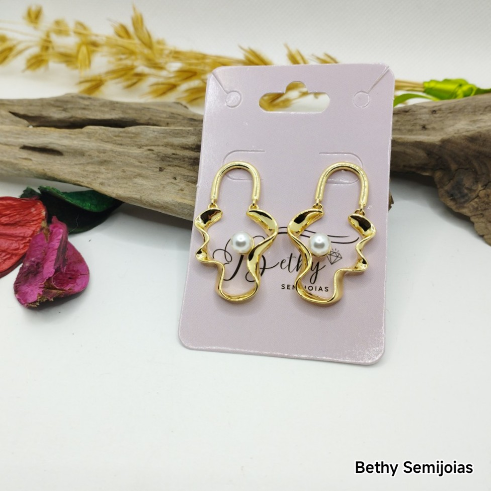 Brinco orgânico com pérola Shell - #4