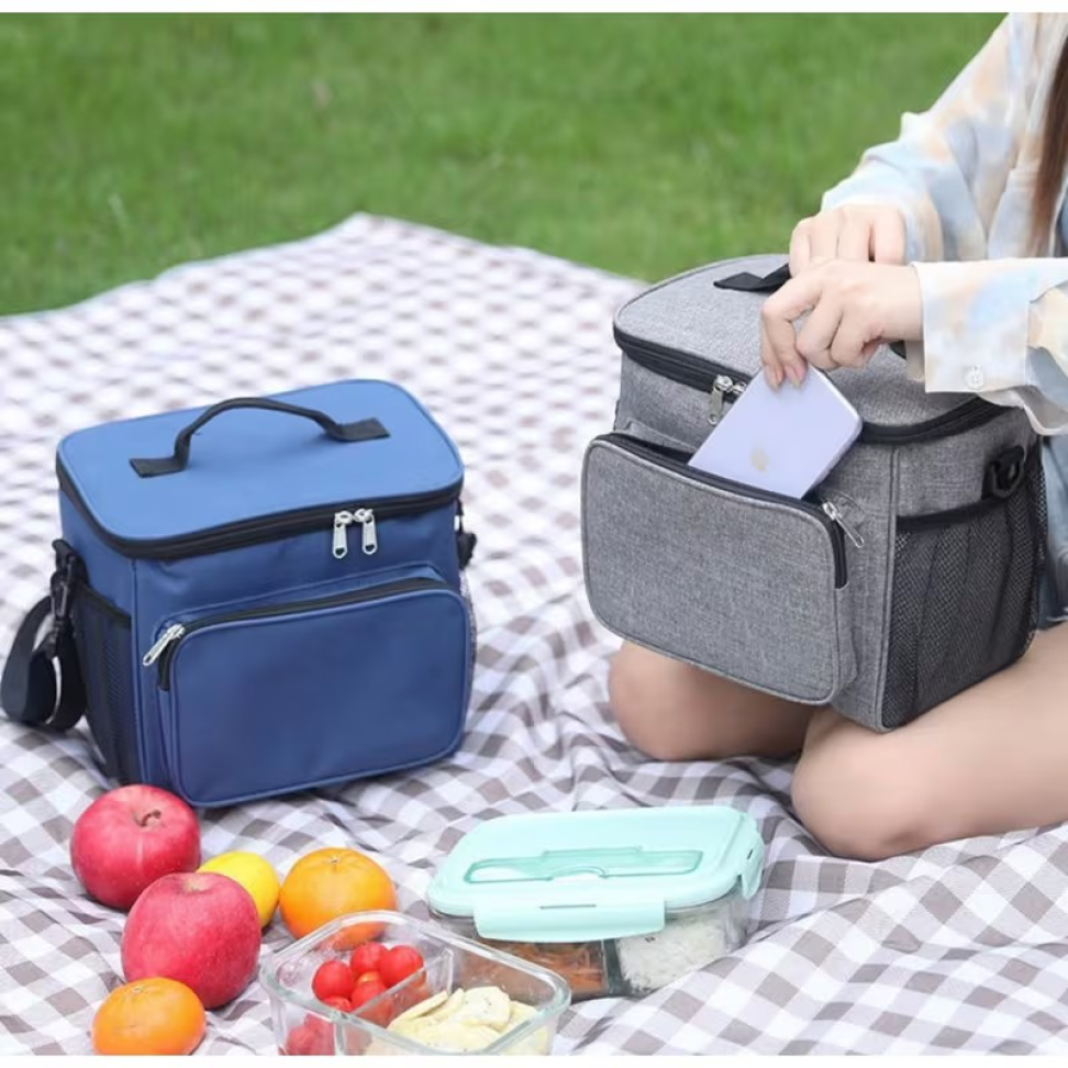 BOLSA TERMICA 14 LTS AZUL CLARO. A: 23 cm  X C: 25 cm X L: 21 cm. - #7