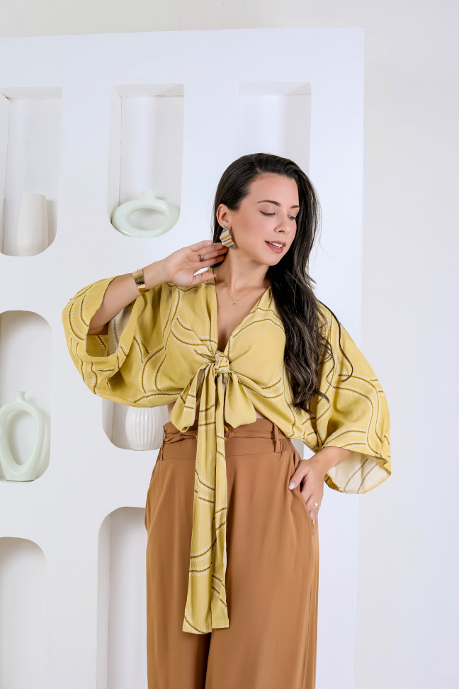 Blusa amarração e pantalona cinto