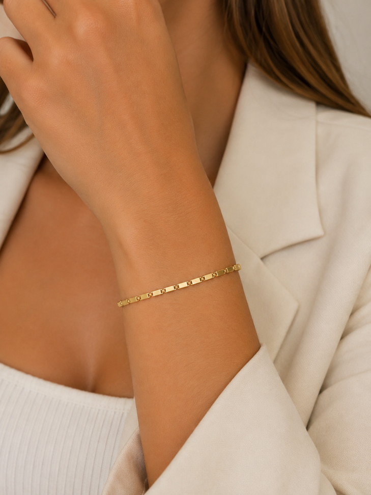 Pulseira filetes dourado